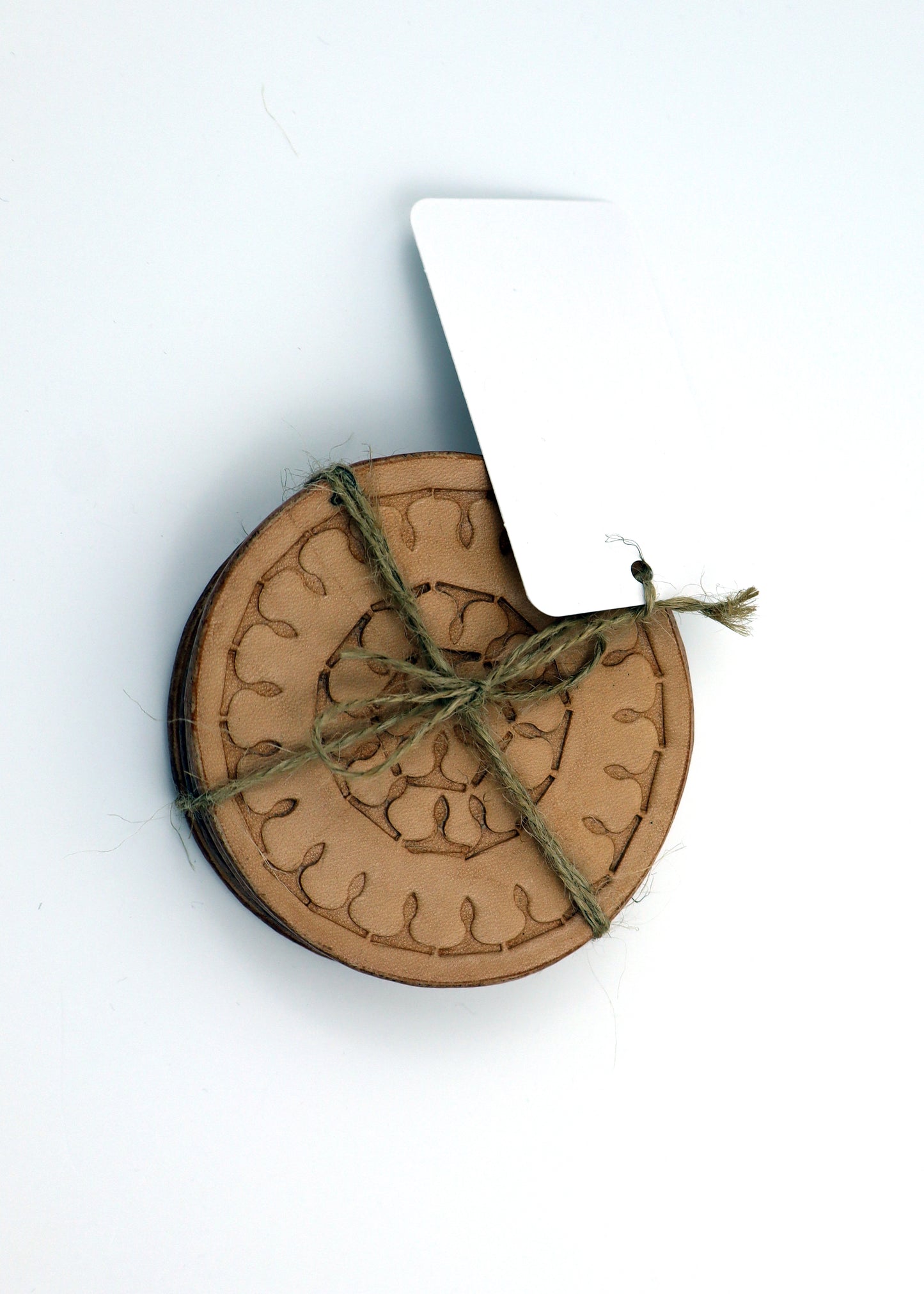 Hank's Stitch Work's Leather Coasters & Key Rings.